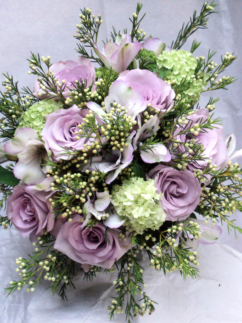 Hand tied wedding flowers bouquets